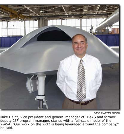 Mike Heinz in front of the X-45A