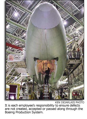 employee working on plane