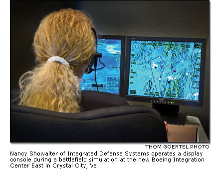 Nancy Showalter operates a display console during a battlefield simulation