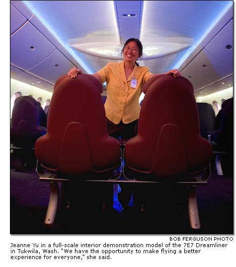 Jeanne Yu in a full-scale interior demonstration model of the 7E7 Dreamliner