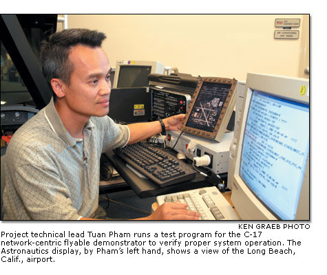 Tuan Pham runs a test program for the C-17 network-centric flyable demonstrator