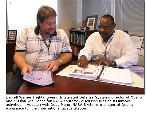 Darrell Warner discusses Mission Assurance activities in Houston with Doug Mann