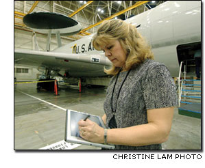 Debbie Ross writing on a Tablet PC