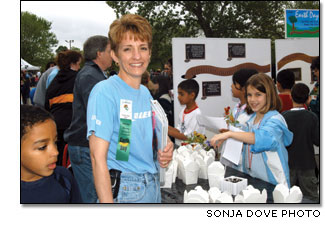 Sue Redington visits a worm adoption station at Earth Day Kansas 2004