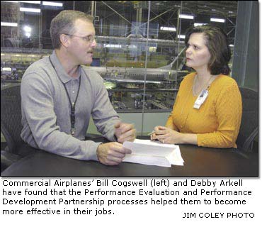 Commercial Airplanes' Bill Cogswell (left) and Debby Arkell