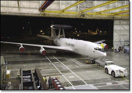 AWAC getting towed out of a Boeing facility