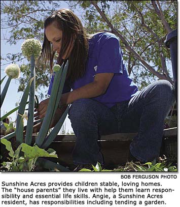 Sunshine Acres resident tending a garden.