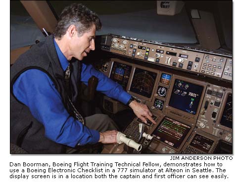 Dan Boorman demonstrates how to use a Boeing Electronic Checklist in a 777 simulator.