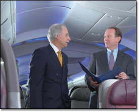 Walt Skowronski (left), Boeing Capital Corporation president, and Scott Scherer, vice president of Aircraft Financial Services, visit the 787 mock-up in Renton, Wash.